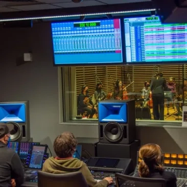 a live recording session from studio G, you can see the performers in the studio through the glass