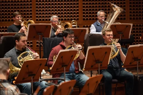 Horn students playing with sfs players on davies stage