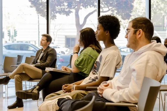 Students listen in the Cha Chi Ming recital hall. 