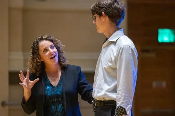 Danielle Thomas works with a student in her Alexander Technique class.