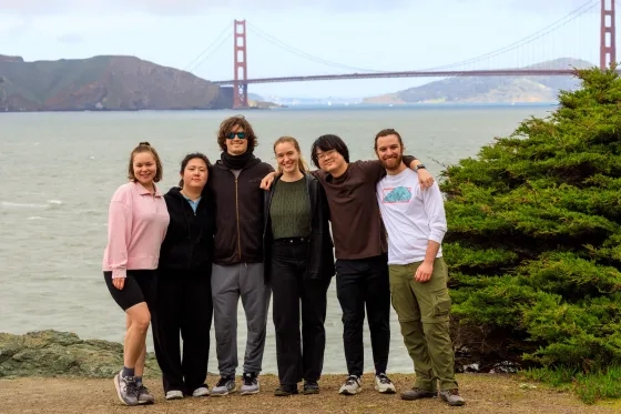 Students in front of the Golden Gate Bridge. 