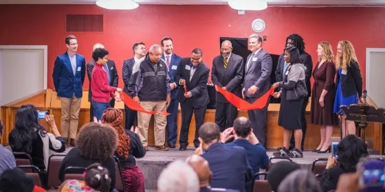 A photo of a pretty typical ceremonial ribbon cutting