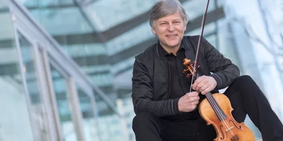 Simon James with violin made by Jean Baptiste Vuillaume in 1827